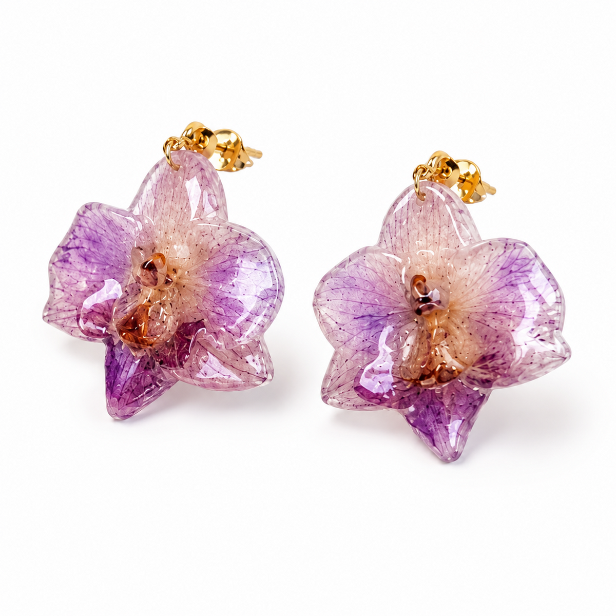 Preserved Colombian purple orchid earrings shown from a second angled view